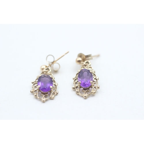 82 - 9ct gold and amethyst drop stud earrings (1.2g)