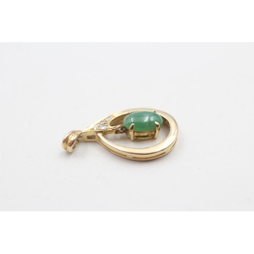 83 - 14ct gold cabochon cut jade & diamond pendant (1.7g)