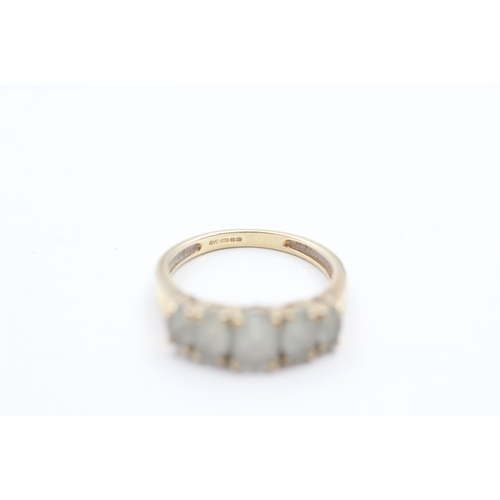 87 - 9ct gold and aquamarine ring (2.5g) Size O 1/2