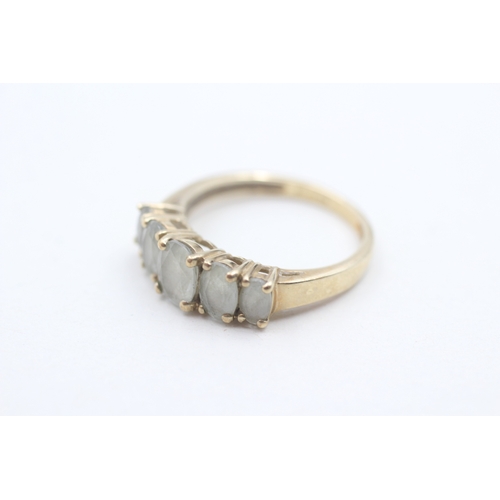 87 - 9ct gold and aquamarine ring (2.5g) Size O 1/2