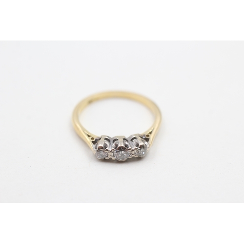 98 - 18ct gold diamond three stone ring (2.5g) Size K