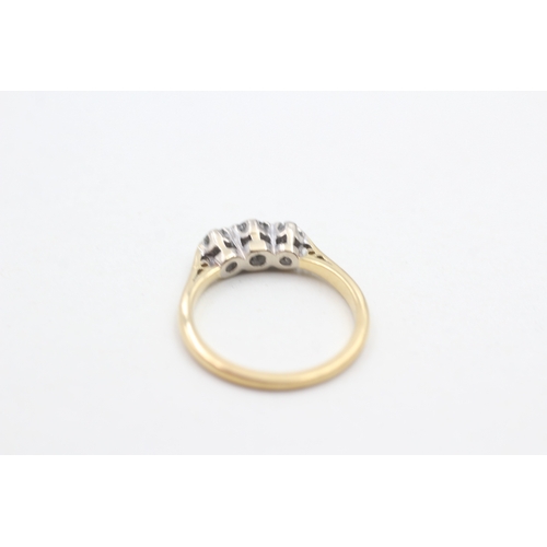 98 - 18ct gold diamond three stone ring (2.5g) Size K