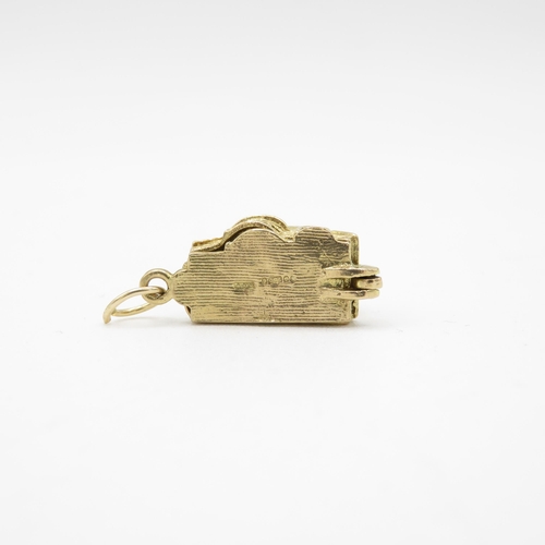 275 - 9ct Gold articulated house charm - 4.4g