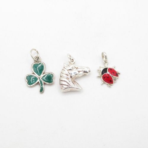 298 - 3 x silver and enamel charm including 3 leaf clover, ladybug and horse - 3.6g