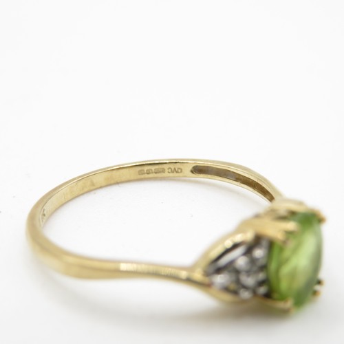 222 - 9ct gold peridot and diamond ring (1.8g) Size Q