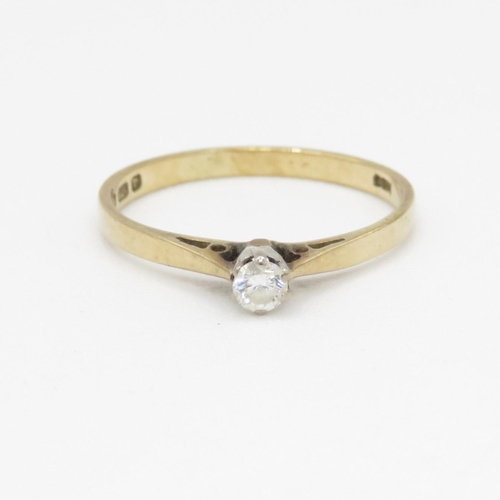 142 - 9ct gold solitaire diamond ring (0.9g) Size J