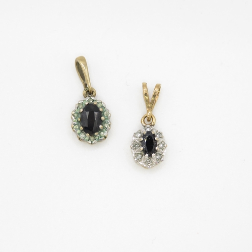 174 - 2 x 9ct gold sapphire and diamond pendants (1.9g)