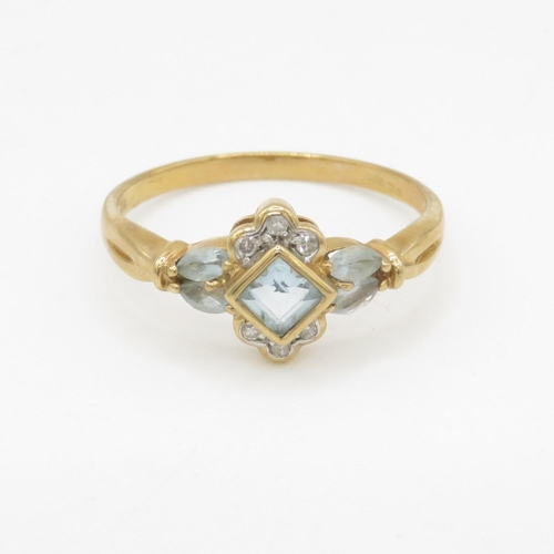 62 - 9ct gold diamond and aquamarine square halo ring (2.7g) Size V