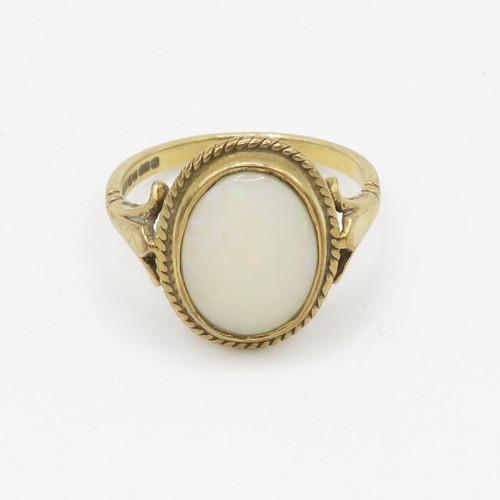 64 - 9ct gold opal dress ring (3.5g) Size O