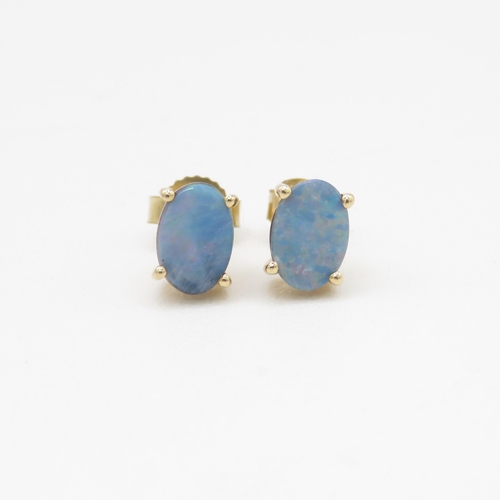 79 - 9ct gold opal doublet stud earrings (0.9g)