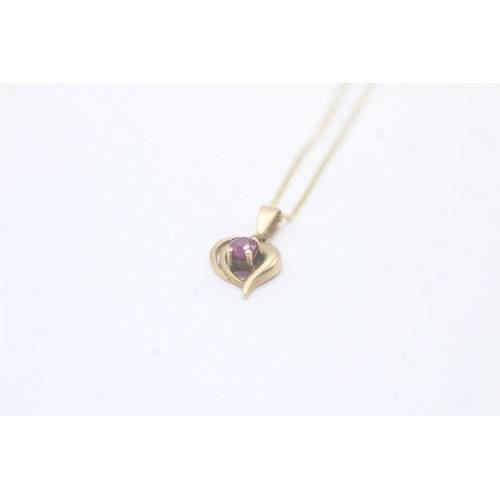 10 - 9ct gold heart pendant with ruby on chain (1.4g)