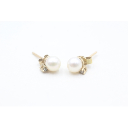 109 - 9ct gold cultured pearl & diamond stud earrings (1.1g)