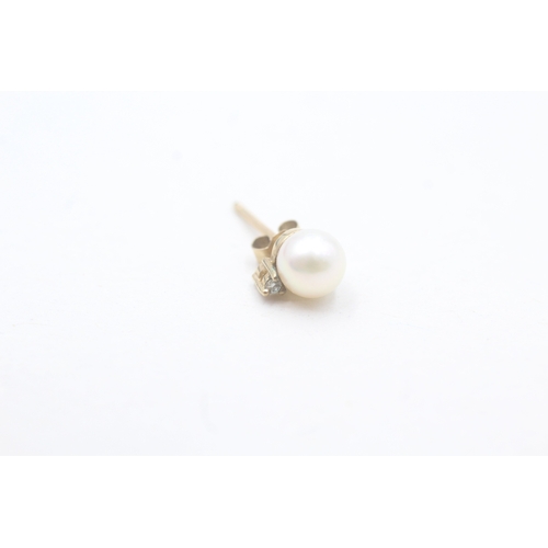 109 - 9ct gold cultured pearl & diamond stud earrings (1.1g)