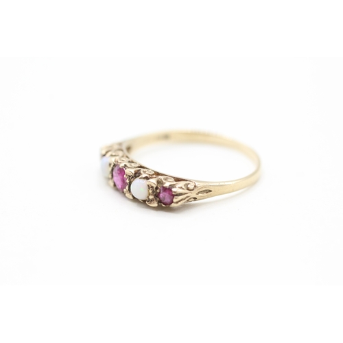 112 - 9ct gold opal and ruby ring (1.6g) Size P