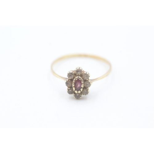 12 - 15ct gold ruby and white gemstone halo set ring (1.6g) Size P