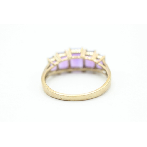 13 - 9ct gold and five stone amethyst ring (2.5g) Size S