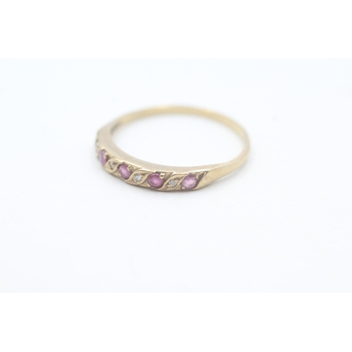 130 - 9ct gold ruby & diamond half eternity ring (1.4g) Size Q 1/2