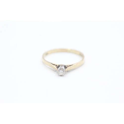 142 - 9ct gold solitaire diamond ring (0.9g) Size J