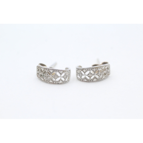 149 - 9ct white gold diamond half hoop earrings (1.2g)