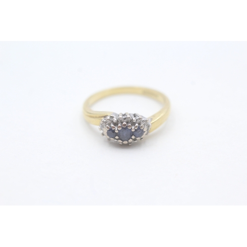 150 - 18ct gold diamond and sapphire halo trilogy ring (3.8g) Size M 1/2