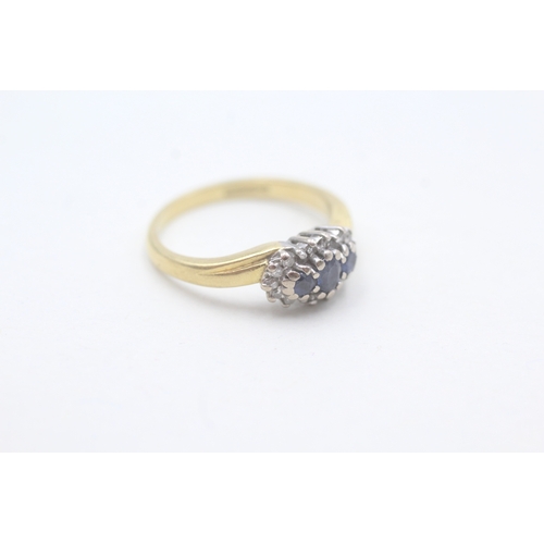 150 - 18ct gold diamond and sapphire halo trilogy ring (3.8g) Size M 1/2