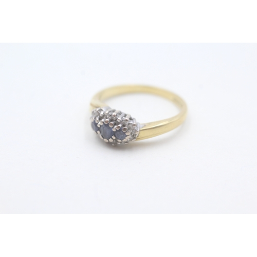 150 - 18ct gold diamond and sapphire halo trilogy ring (3.8g) Size M 1/2