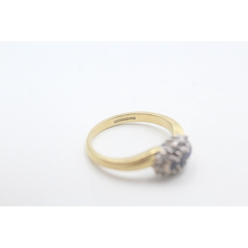 150 - 18ct gold diamond and sapphire halo trilogy ring (3.8g) Size M 1/2