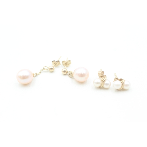 153 - 2 x 9ct gold cultured pearl stud and drop earrings (2.6g)