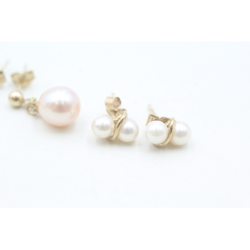 153 - 2 x 9ct gold cultured pearl stud and drop earrings (2.6g)