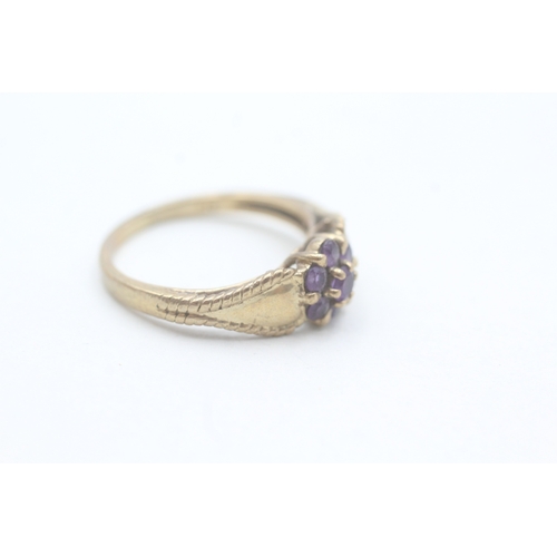 155 - 9ct gold and amethyst flower cluster set ring (2.8g) Size P