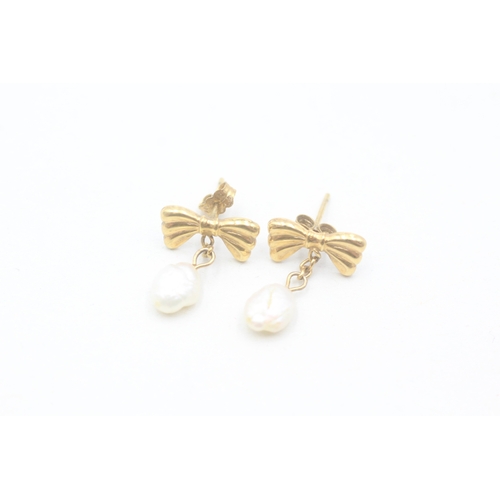 177 - 9ct gold rice pearl drop stud earrings (0.9g)