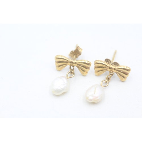 177 - 9ct gold rice pearl drop stud earrings (0.9g)