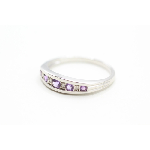 20 - 9ct gold amethyst and diamond row set ring (2.5g) Size U