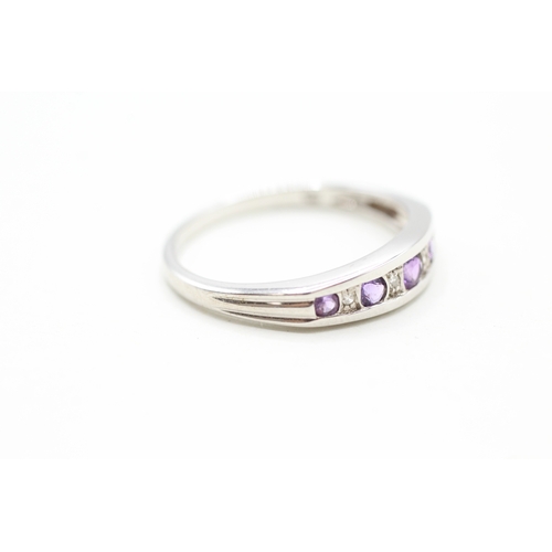 20 - 9ct gold amethyst and diamond row set ring (2.5g) Size U