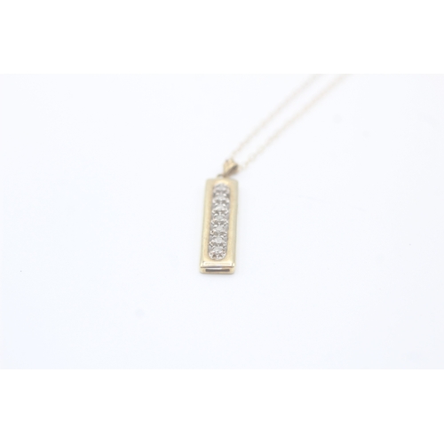 24 - 9ct gold and diamond pendant on chain (1.7g)