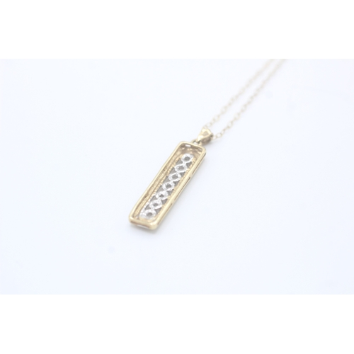 24 - 9ct gold and diamond pendant on chain (1.7g)