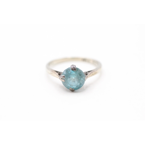 25 - 9ct gold blue zircon dress ring (2.1g) Size L