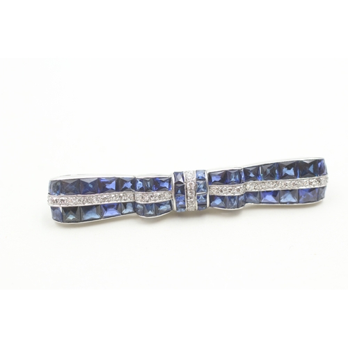 3 - 950 platinum sapphire and diamond bow design bar brooch (10g)