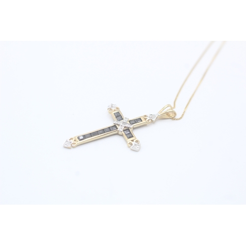 40 - 9ct gold sapphire and diamond cross pendant on chain (1.8g)