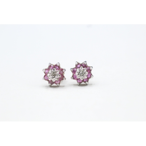 44 - 9ct gold diamond and ruby flower cluster stud earrings (1.1g)