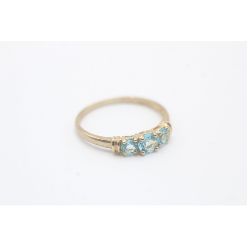 6 - 9ct gold and blue gemstone ring (2g) Size V