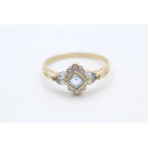 62 - 9ct gold diamond and aquamarine square halo ring (2.7g) Size V