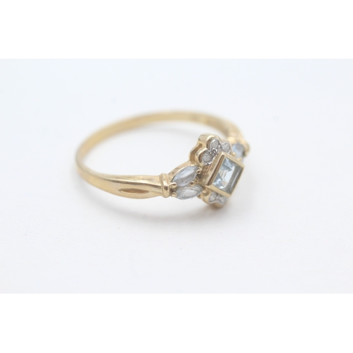 62 - 9ct gold diamond and aquamarine square halo ring (2.7g) Size V