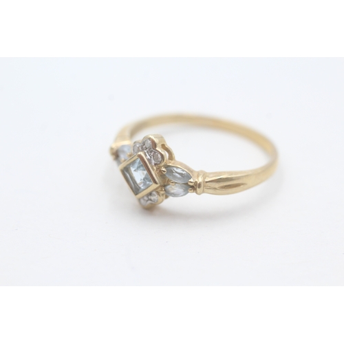 62 - 9ct gold diamond and aquamarine square halo ring (2.7g) Size V