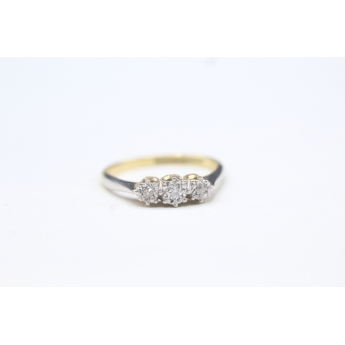 68 - 18ct gold & platinum diamond three stone ring (2.3g) Size J 1/2