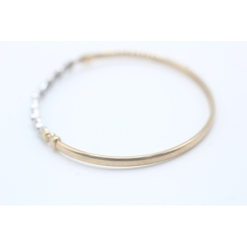 7 - 9ct gold and diamond bangle (5.1g)