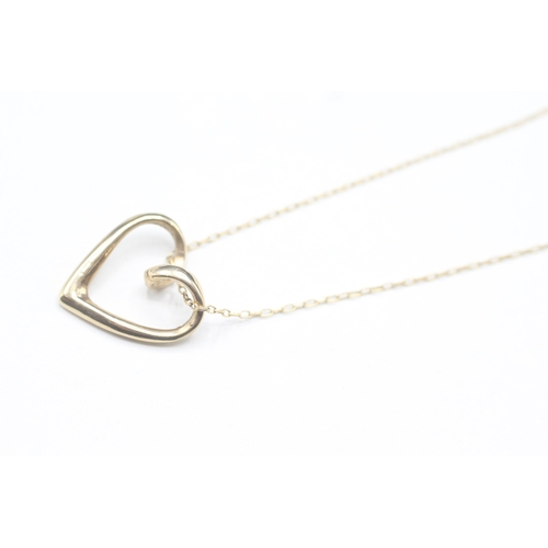 73 - 9ct gold heart pendant on chain (3.5g)