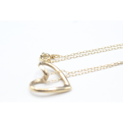 73 - 9ct gold heart pendant on chain (3.5g)