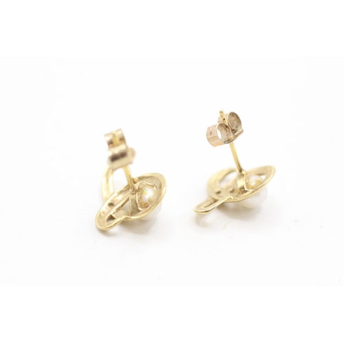 95 - 9ct gold cultured pearl stud earrings (1.3g)