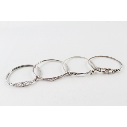 253 - Collection of Sterling Silver Bangles inc. CZ, Celtic Designs x 4 34g